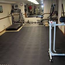 An excellent solution for an economical and easy to install home exercise room flooring is the gym workout flooring pebble top. Fatigue Floor Tile Aerobic Staylock Bump Top