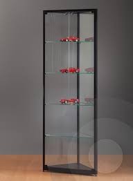 Glass corner cabinet are spacious to fit in a lot of items for display. Black Corner Retail Display Cabinet With Glass Top Black Showcase