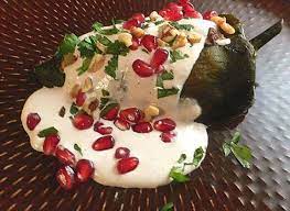 Chiles In Walnut Sauce Like Water For Chocolate Walnut Sauce Vegetarian Christmas Recipes Stuffed Peppers