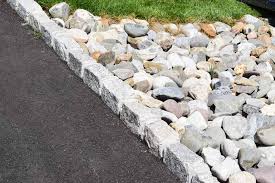 Belgian block curbing and edging can be incorporated throughout your terrain, both sprucing up and potentially adding value to your home or business. Stone Center Landscape Stone Decorative Stone Veneer
