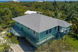 A knot in thyme offers green, variegated and mixed holly wreathes and boxed holly; Great Guana Cay Abaco Long Thyme Knot Sea Cottage Vacation Rental