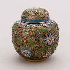 The word is believed to be derived from catty, the chinese pound, equal to about a pound and a third avoirdupois. A Chinese Tea Caddy Cloisonne Enamel Brass First Half Of The 20th Century Bukowskis