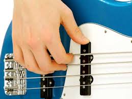 How To Hold A Bass Guitar Learn To Play Music