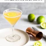 Dip the rims of 4 margarita glasses in amaretto, then into sugar; Italian Margarita Food Banjo