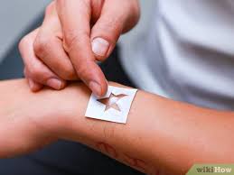 I made a shape from ductape and kept it on during the time i spent in the sun. 4 Ways To Get A Tan Tattoo Wikihow
