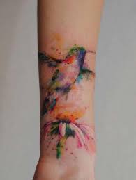 Luckily for you, even within the style of watercolor tattoos, there are different techniques to choose from for your next body art piece. Flying Hummingbird Watercolor Tattoo On Wrist