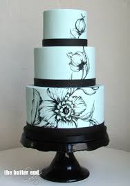 Black And Blue Wedding Cake Hand Painted Wedding Cake On Light Blue Background With Black Flowers By The Butter End Cakery Painted Wedding Cake Hand Painted Cakes Flower Cake Decorations