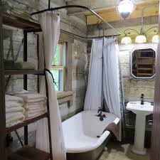 This clawfoot shower surround set comes with everything needed for setting up a stand up shower this is a wall mounted clawfoot shower surround set with gooseneck faucet and diverter valve. Twin Oaks Log Cabin Bathroom With Antique Clawfoot Tub Shower Picture Of Timber Ridge Outpost Cabins Elizabethtown Tripadvisor