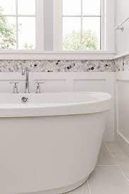 Earthy narrow tiles for a bathroom wall border. White Gray And Black River Rock Border Tiles Transitional Bathroom Bathroom Border Tiles Bathroom Wall Tile Tile Bathroom