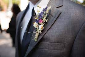 Coordinating your prom flowers with your prom dress. Boutonnieres Corsages How To Wear These Wedding Florals