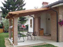 Progettazione, costruzione e consegna di una tettoia in legno verniciata per esterno, completa di fissaggio a terra per mezzo di piastre metalliche. Come Costruire Una Tettoia In Legno Pergole E Tettoie Da Giardino Tettoia In Legno Arredamento Veranda Cortile Giardino In Mattoni Terrazza Con Pergola