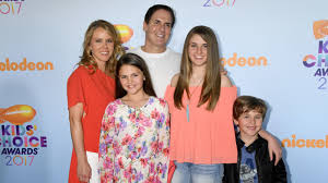 Us business magnate and mavericks owner mark cuban laughs joining his wife tiffany and children after a basketball friendly match between alba berlin and dallas mavericks in berlin on october 6 Mark Cuban Would Run For President In 2020 If He Was Single