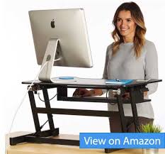 Office standing desk, ergonomic chair, monitor stand, other accessories. Best Desk Risers And Stands For Laptops And Monitors And Why You Need One Ergonomic Trends