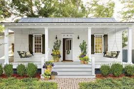 The modern cottage style combines old world charm with modern amenities. 6 Tips For Living In A 660 Square Foot Cottage House Exterior Porch Design House Front