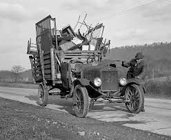 In this march 29, 1937 file photo, the desolation in this part of the dust bowl is graphically illustrated by these rippling dunes banked against a fence, farm home, barn and windmill in guymon, oklahoma. Living New Deal