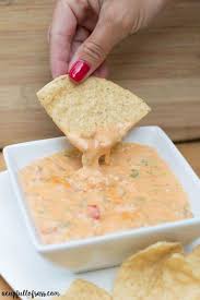 How to make nacho cheese sauce: Crockpot Nacho Cheese Dip The Perfect Appetizer For A Crowd Princess Pinky Girl