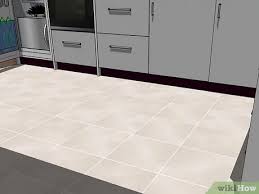 When considering your flooring and cabinets, think about which elements you want to match and which you don't. 4 Ways To Pick Flooring Color For Your Kitchen Wikihow