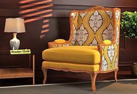 Living room is the go to place of any home, be it spending time with your family, friends, inviting guests. Adire Wingback Chair Mustard Coral Wooden Lounge Chair Chair Wing Chair