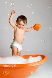 And when you're taking a bath with your baby, keep both hands on her at all times. Happy Baby With Sponge Ready To Take Bath Stock Photo Picture And Royalty Free Image Image 4383440
