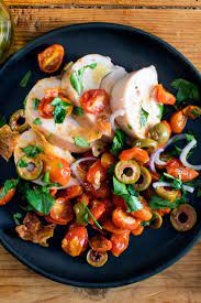 Nyt Cooking Slowly Poaching Bone In Chicken Breasts In A Very Low Oven Makes The Meat Extremely Silky Wi Poaching Chicken Breasts Poached Chicken Onion Salad