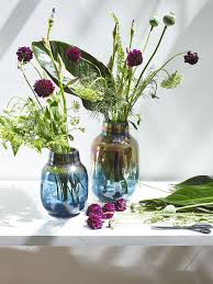1900, h 15 1/4 overall, dia 6 1/4:bottle green glass with iridescent accents, fitted within an read more… This Iridescent Glass Vase From Oliver Bonas Will Give Your Living Room The Wow Factor