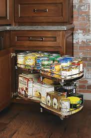 Finally, set the basket according to holes in the bottom and secure the unit to the cabinet floor with screws. Kitchen Cabinet Organization Products Schrock