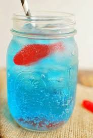Mix Sprite And A Little Bit Of Blue Gatorade Add Ice Amp A Swedish Fish A Fun Summer Drink For Kiddos Kid Drinks Drinks Blue Food Coloring