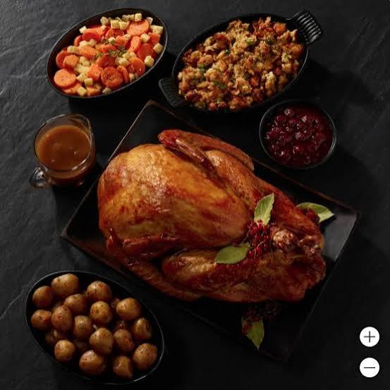 Costco Thanksgiving dinner items including turkey sides and desserts.