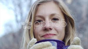 Free for commercial use no attribution required high quality images. Pretty Blonde Teen With Mittens Sips A H Stock Video Pond5