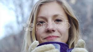 Pretty little thing basic bandeau top. Pretty Blonde Teen With Mittens Sips A H Stock Video Pond5