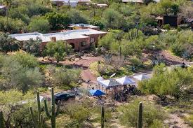 See investigators search Nancy Guthrie's house outside Tucson