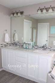 Dark kitchen cabinets aren't a thing of the past! Tips On How To Paint Dark Veneer Cabinets White With Iced White Quartz Counter Tops Keeping It Simple