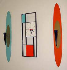 The peter pepper, capsicum annuum var. Peter Pepper Products Orange And Blue Wall Sconces With A Sunbeam Clock Mid Century Clock Retro Clock Mid Century Decor