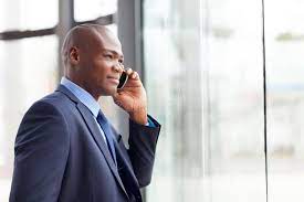 African Businessman Mobile Handsome African American Businessman Talking On Mob Sponsored Handsome African Mo Business Man Corporate Portrait African