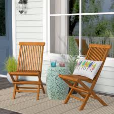 Plastic folding chairs are lightweight and easy to clean, so they are a good option for a variety of activities. Beachcrest Home Millbrook Folding Teak Patio Dining Chair Reviews Wayfair
