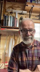 Fabricating a pair of X-braces for an acoustic guitar build. I mark them  using the radius dish and rough cut them