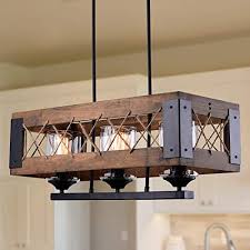 Wrought iron kitchen island light fixtures. Buy Laluz Pendant Lighting For Kitchen Island 3 Light Lantern Wooden Chandelier In Painted Black Metal With Clear Glass Shades Hemp Ropes 24l 10 6w 10 2h Rustic Light Fixture Online In Indonesia B01n1fio90