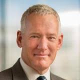 Who is responsible for an HOA assessment when selling a condo?