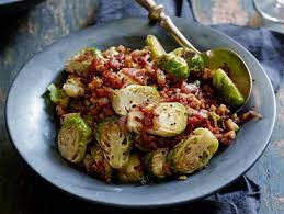 Bobby flay thanksgiving throwdown brussel sprouts. Roasted Brussels Sprouts With Pomegranates And Vanilla Pecan Butter Recipe Bobby Flay Cooking Channel