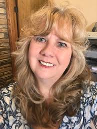 Empowered woman rises from difficult past