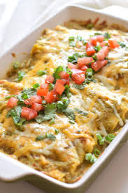 Covered In An Easy Homemade Tomatillo Salsa Verde These Baked Mexican Salsa Verde Chicke Mexican Food Recipes Salsa Verde Chicken Enchiladas Enchilada Recipes