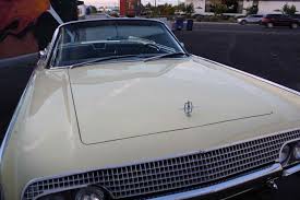 Image result for Sunburst Gold 1961 Lincoln