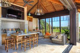 Tropical Style Outdoor Kitchen Enclosed But Opens To Outside With Stack Back Sliding Covered Outdoor Kitchens Indoor Outdoor Kitchen Outdoor Kitchen Design