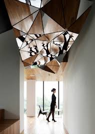 Japanese Architects Like To Use The Word Ldquo Growing Rdquo For A Building Breaking Out From The Ceiling Design Mirror Ceiling Interior Architecture Design