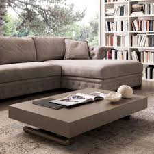 Once in a while you should rest your feet onto it, once in a while it sets as a coloring tone, and some times it is good enough as a work area. Extendable Table From Coffee Table To Dining Table Gilmore