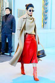 Celebrity Winter Outfits 5 Looks We Want To Copy This Week Who What Wear Red Outfit Winter Winter Outfits Red Skirts