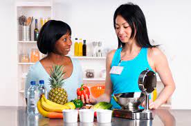 What is a health coach and should you hire one instead of a personal trainer or dietitian? Health Coach