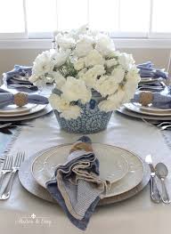 To add some elegance to a spring table, pick up some taper candles. Simple Yet Elegant Summer Table Setting In Blue White