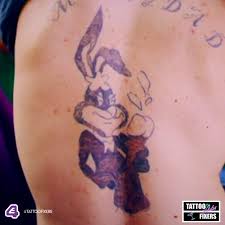 Bugs bunny first appeared on screen in 1938 as the cheeky adversary of porky pig in the warner bros that does not mean to say that bugs bunny tattoos would not get heads turning and people. Tattoo Fixers Extreme On Twitter That Is One Big Bunny Sketchreppinink Has His Work Cut Out For Him Tattoofixers