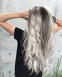 The range of colors in the hair is wide, from coffee brown to white, but beautifully blended lines the mix of golden blonde with silver highlighting in the top layers adds lots of texture to this cute wavy long hairstyle. 19 Super Trendy Blonde Grey Hair Ideas Styleoholic